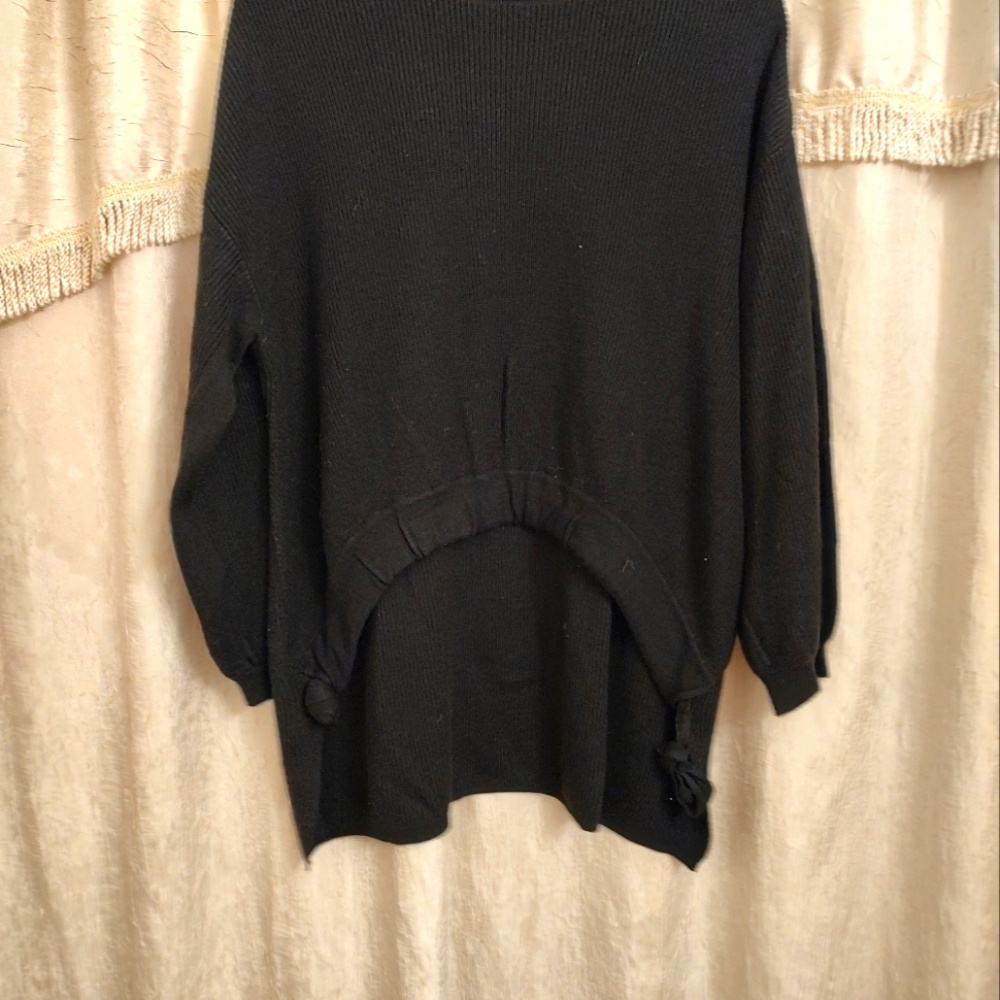 Black, high low hem, sweater. Size medium